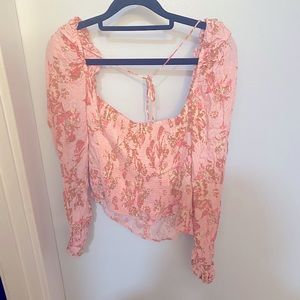 Free people shirt new w tags. Retail price 98$